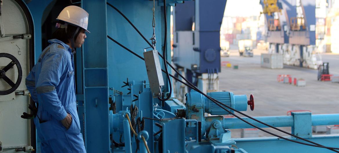 A seafarer on board a ship at Felixstowe Port in England.